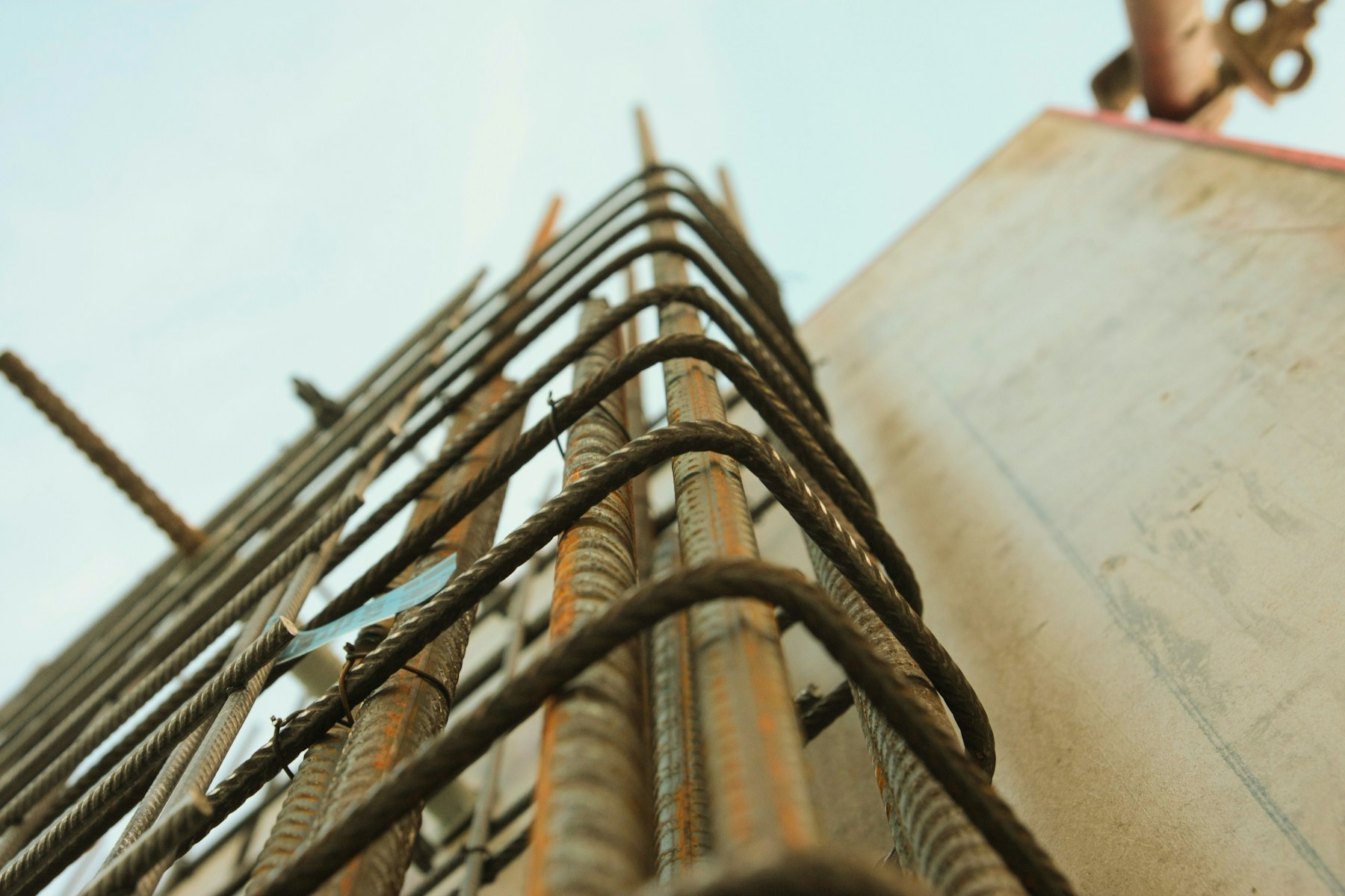Construction reference: reinforcing steel at a formed concrete edge.