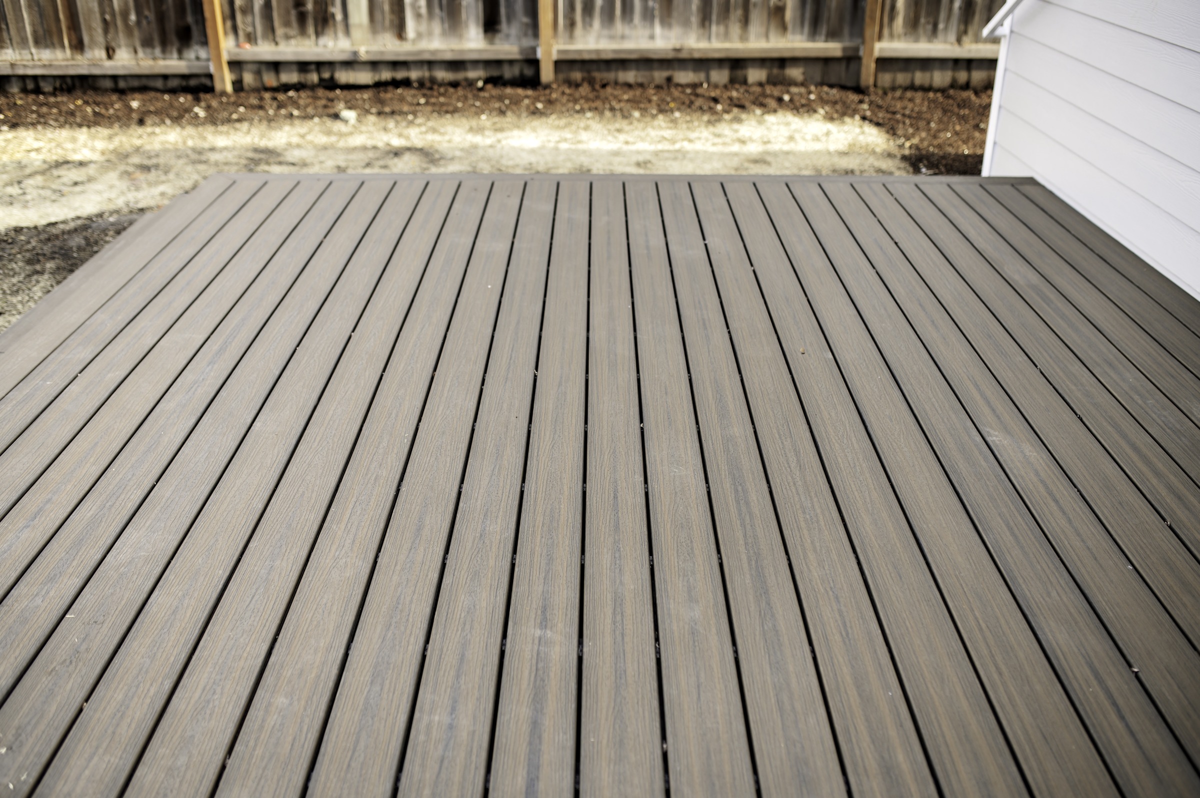 Deck boards with a contrasting perimeter border